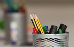 Image of a pot with pencils and highlighters